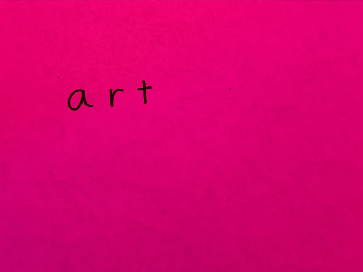 a piece of paper with the words 'art' written on it