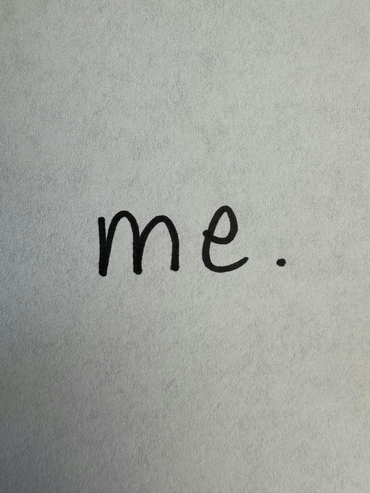 picture of a piece of paper with the words 'me.' written on it